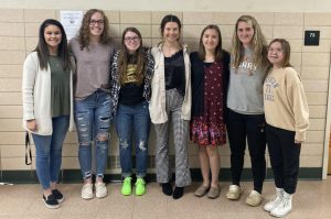From left: Madyson Rivera, Miranda Nickerson, Chloe Anthony, Olivia Jaworski, Taylor Fenstermaker, Haylee Dyne, and Maleri Mather. The honorees gather in the hallway 