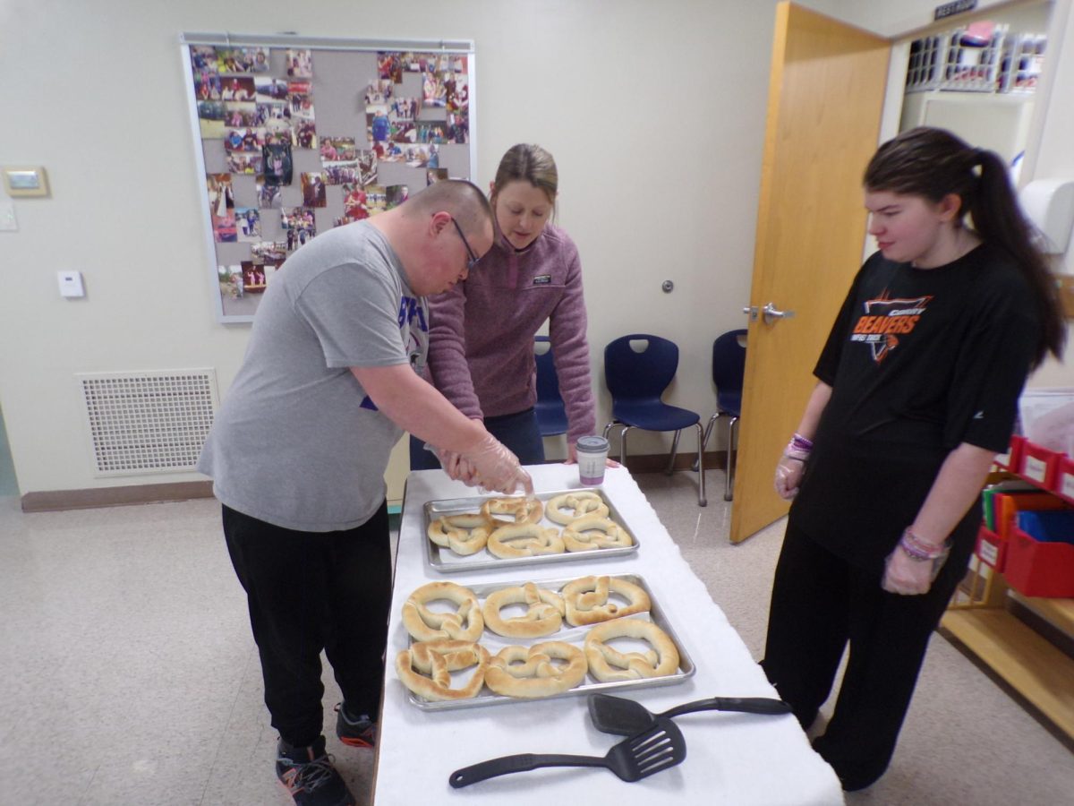 Mrs. Nosel oversees pretzel preparation