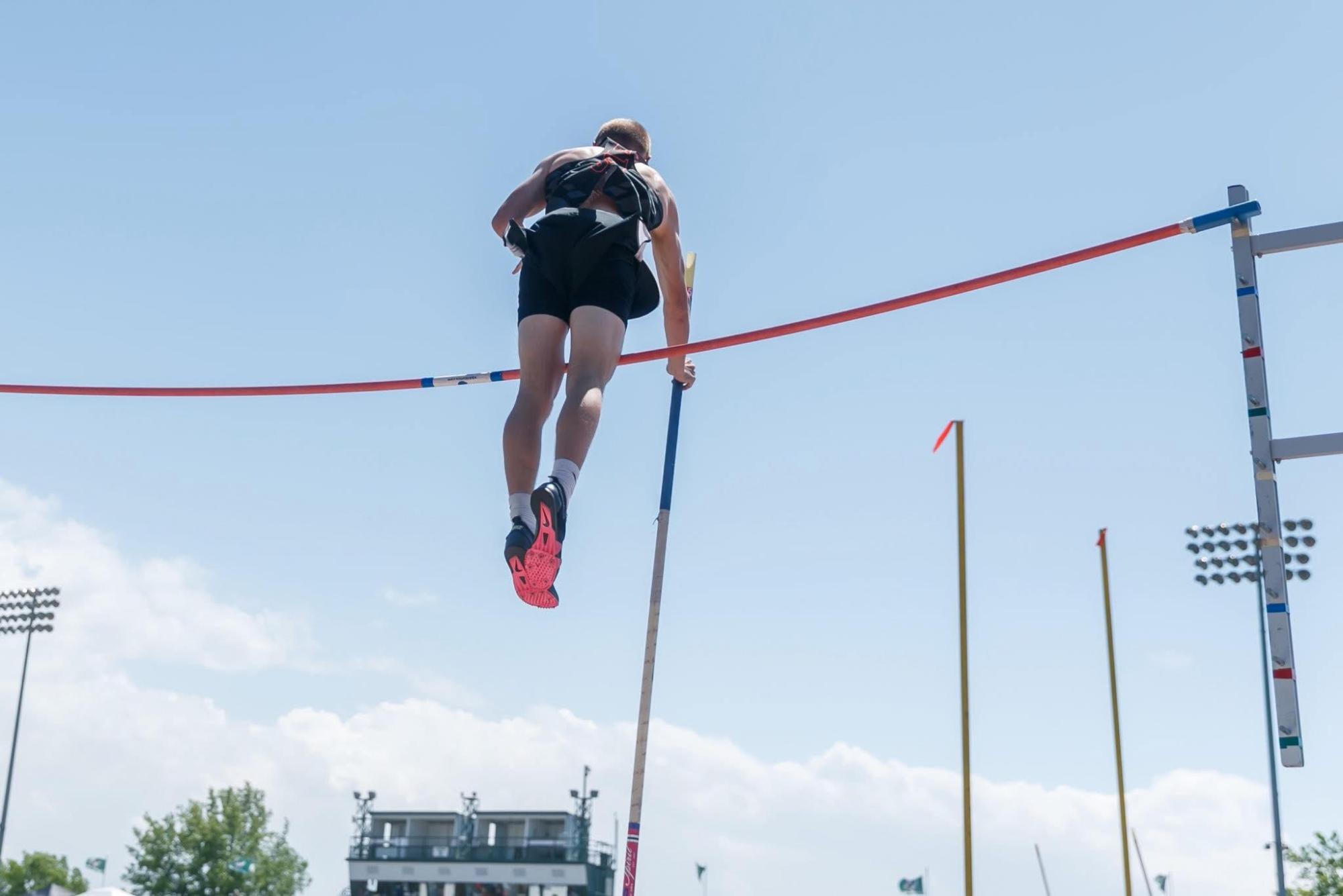 Pictured: Senior Isaiah Bayle (State Qualifier) doing Pole Vault at D10 Championship Tack meet. 