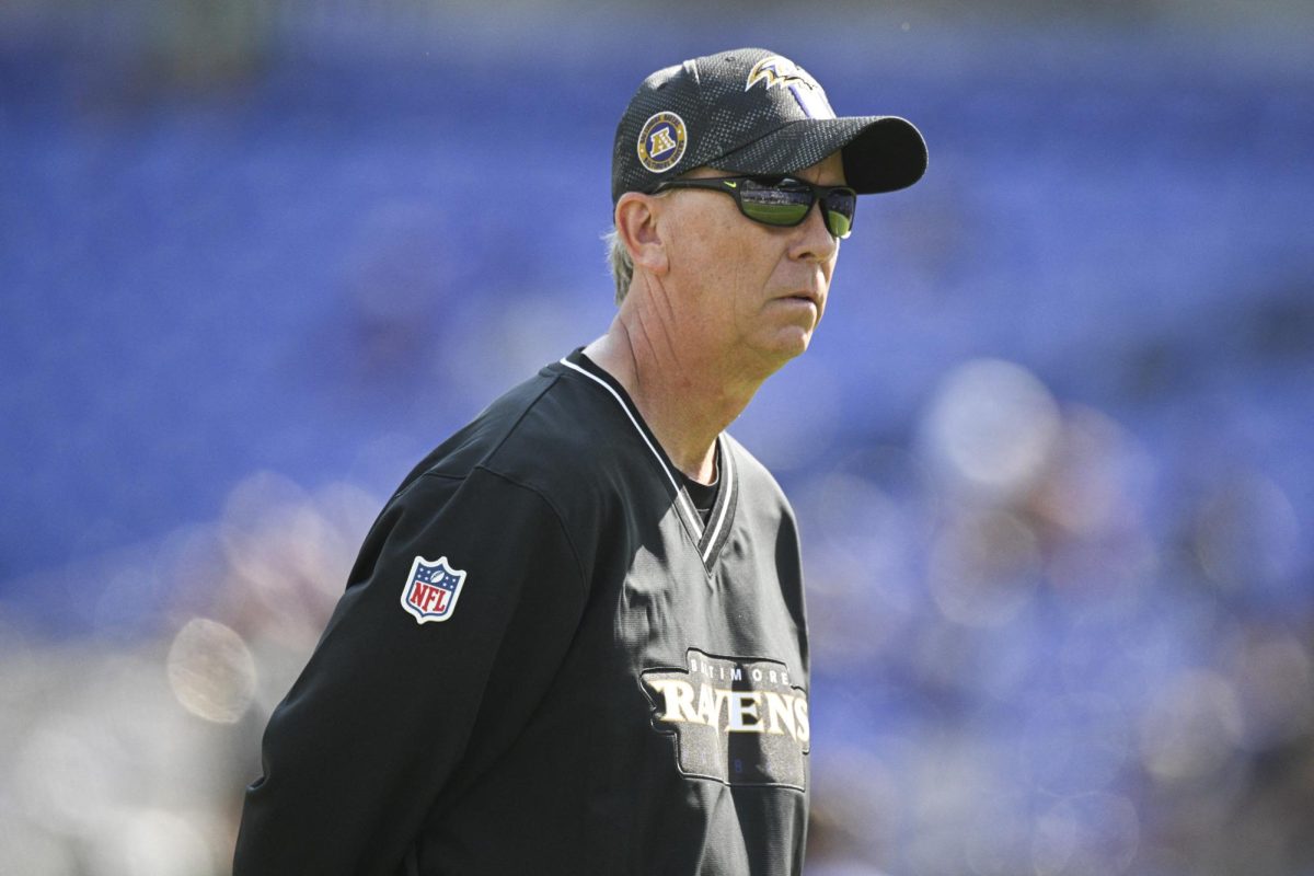 Oct 13, 2024; Baltimore, Maryland, USA;  Baltimore Ravens offensive coordinator Todd Monken on the field before the game against the Washington Commanders at M&T Bank Stadium. Tommy Gilligan-Imagn Images