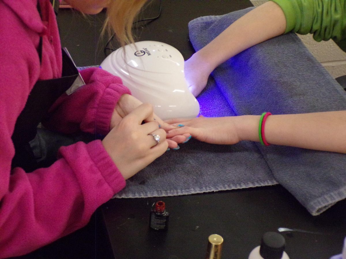 Cosmotology class offers free hair and nail treatments to middle school students