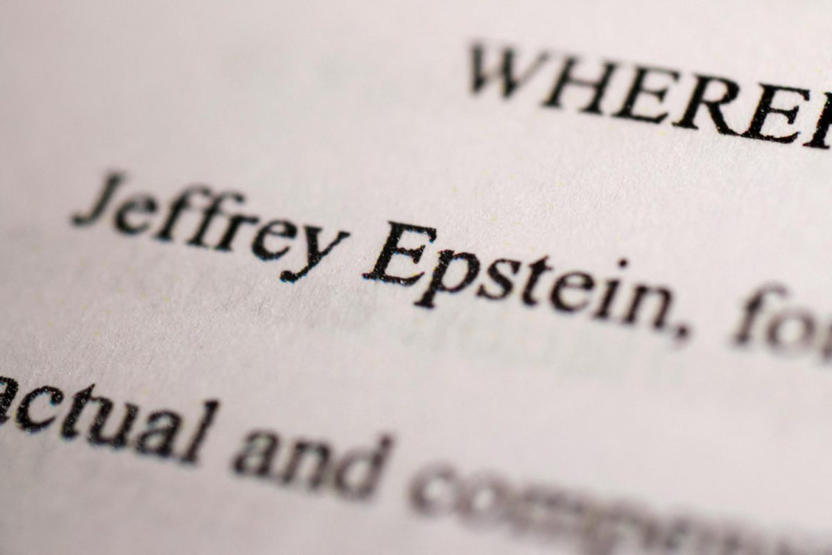 Newly-released documents from disgraced late financier and sex offender Jeffrey Epstein, referencing court cases against him, are seen in this handout released by the U.S. Justice Department and printed and arranged for a photograph by Reuters in Washington, D.C., U.S., December 19, 2025. REUTERS/Jonathan Ernst