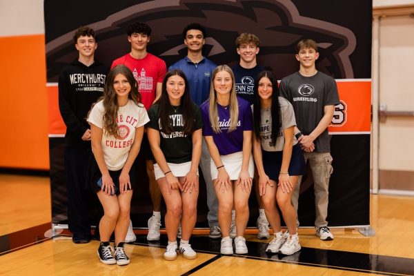 Senior student athletes pose together on Decision Day: [Back Row] Gavin Kent, Keaton Frisina, Blake Cook, Steven Willis, Marcus Meredith, [Front Row] Shay Linden, Marleigh Martin, Mahra Goodwill, Brynley Watrous